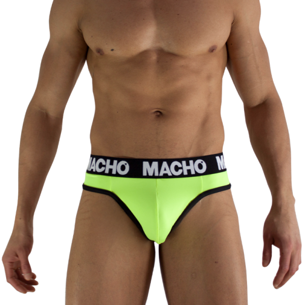 Hombre con calzoncillos verdes neón ajustados