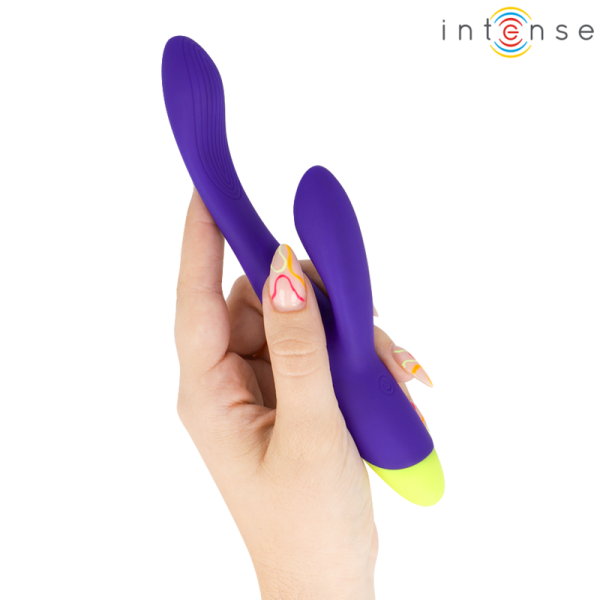Vibrador morado de doble punta en mano